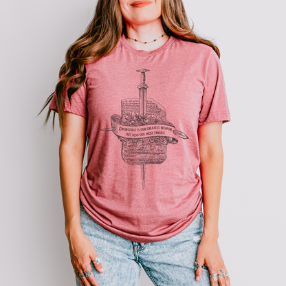 Model wearing of heather mauve Knowledge tee, inspired by Orin Steele