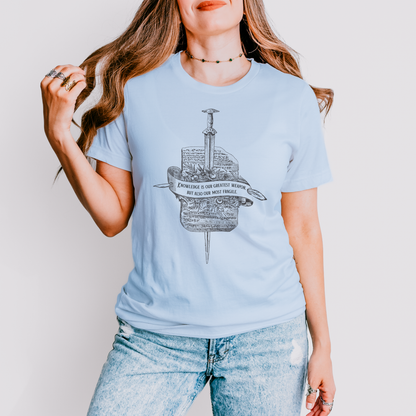 Model wearing of light blue Knowledge tee, inspired by Orin Steele