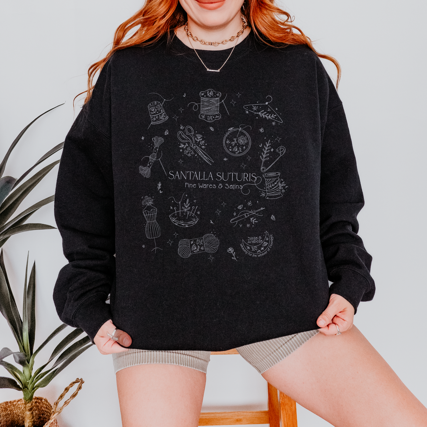 Model wearing of black Tailor sweatshirt, inspired by Orin Steele